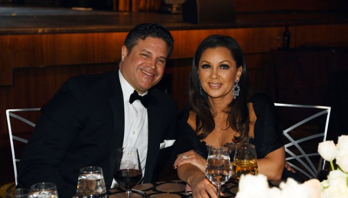 Jim Skrip and Vanessa Williams at a dinner party. 